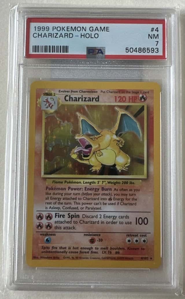 PSA 7 - 1999 Charizard Base Set Holo 4/102…Rain Swirl Pattern!!!!🔥🔥