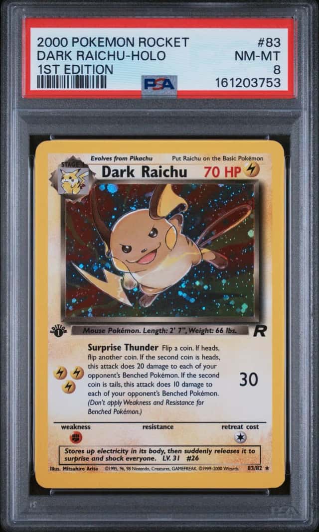 The Pokémon Company 2000 Dark Raichu 83/82 Team Rocket Holo 1st PSA 8
