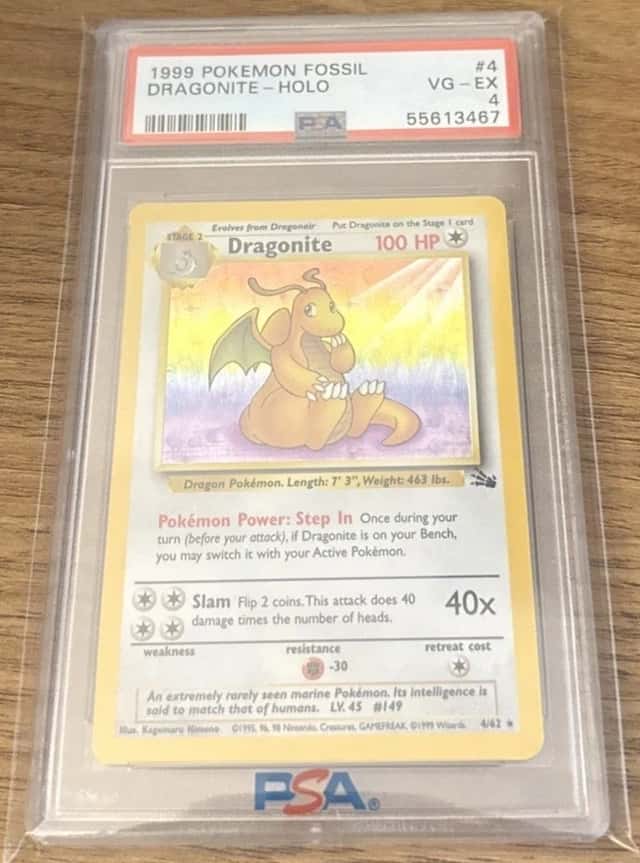 1999 POKEMON FOSSIL #4 DRAGONITE-HOLO PSA 4